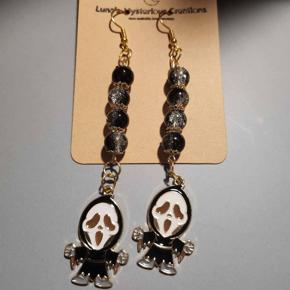 Slasher dangling earrings